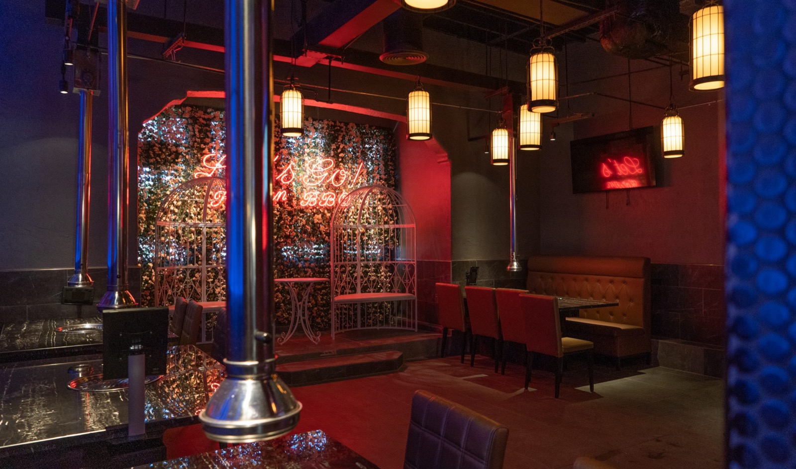 Our Interior Gaja Korean BBQ interior with neon lights and booth seating Oceanside