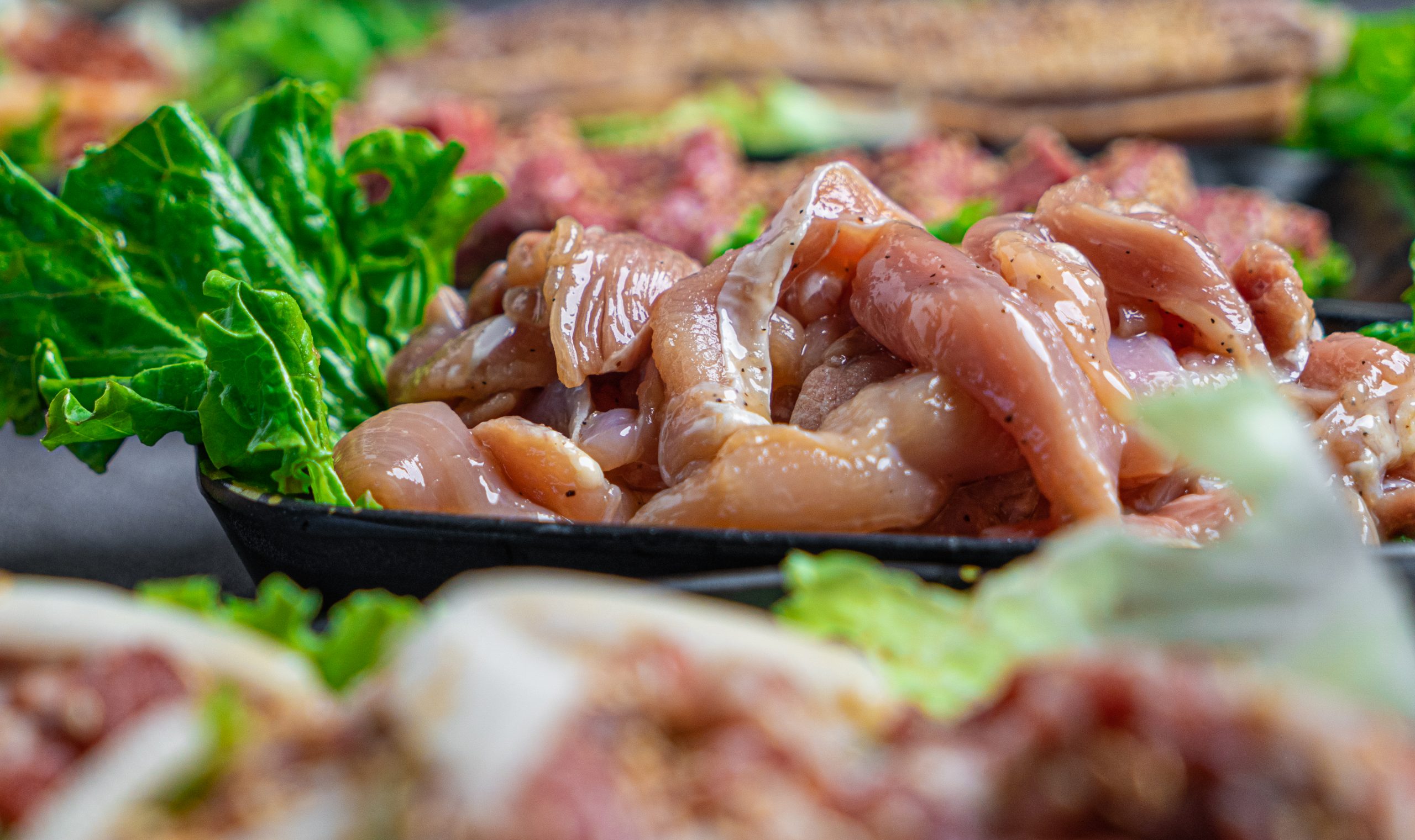 Premium Cuts Close-up of marinated raw meats ready for Korean BBQ grill